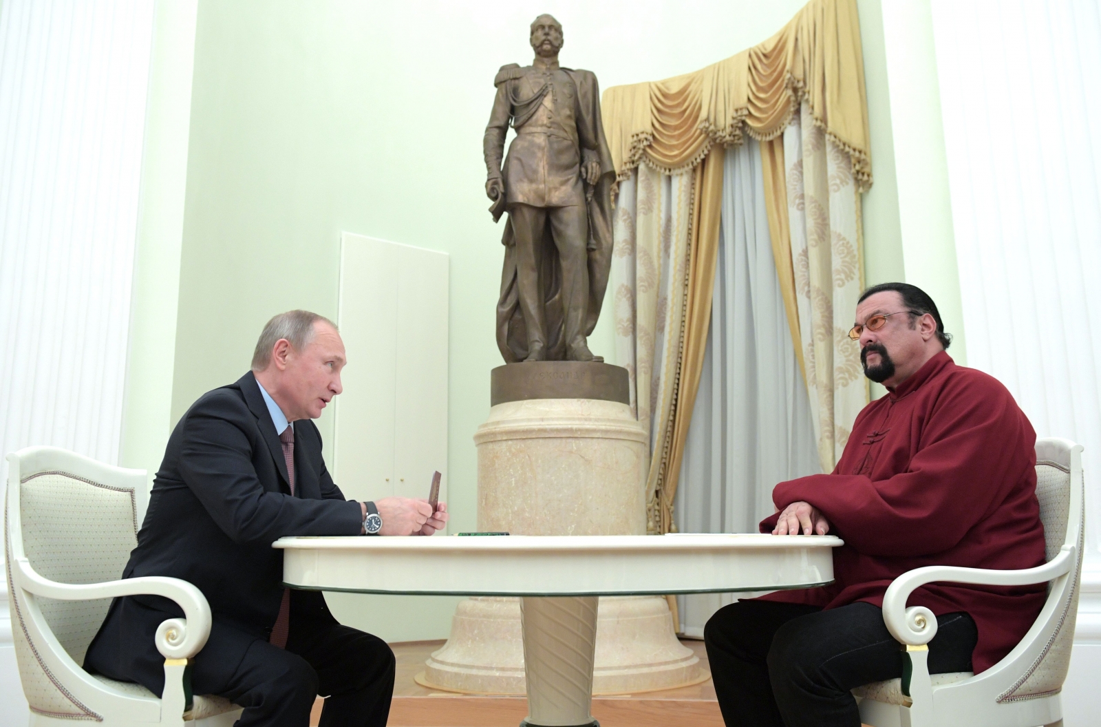 President Putin Personally Hands Steven Seagal Russian Passport ...