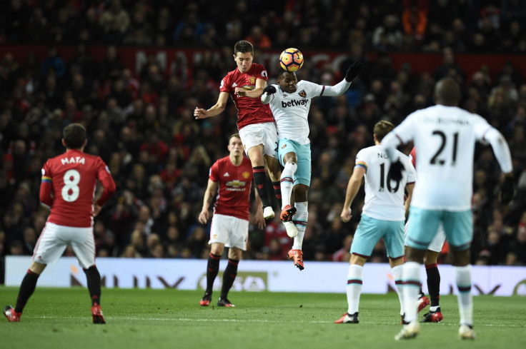 Ander Herrera challenges for the ball