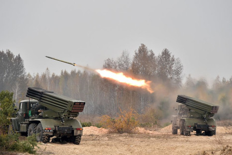 Ukrainian 122 mm MLRS BM-21 Grad fires rocket during a military exercise at a shooting range close to Devichiki in the Kiev region