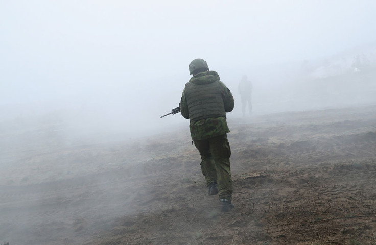  Lithuanian infantry soldiers participate in the Iron Sword multinational military exercises on November 24, 2016 near Pabrade, Lithuania. 