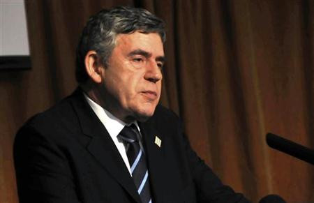 Former Prime Minister Gordon Brown speaks to African leaders at the sidelines of African Union meeting in Uganda's capital Kampala