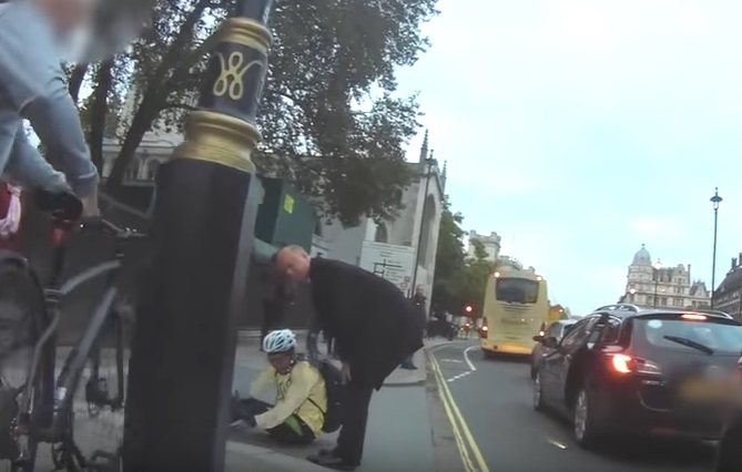Chris Grayling and cyclist