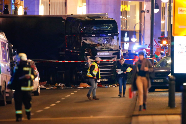 Police work at the site of an accident at a Christmas market on Breitscheidplatz square, Berlin