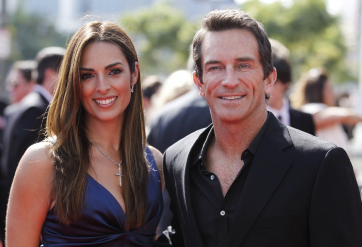 Host of reality show &quot;Survivor&quot; Jeff Probst (R), nominated for Outstanding Host For A Reality Or Reality-Competition Program, and guest arrive at the 2011 Primetime Creative Arts Emmy Awards in Los Angeles