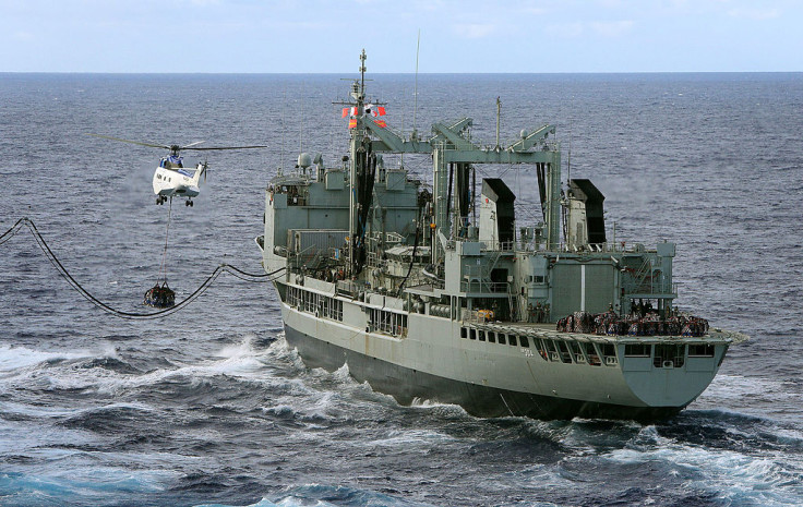In this handout image provided by Commonwealth of Australia, Department of Defence, HMAS Success conducts a Replenishment at Sea with United States Navy Ship (USNS) Cesar Chavez, as USNS Cesar Chavez's helicopter, a Super Puma, conducts a Vertical Replen In this handout image provided by Commonwealth of Australia, Department of Defence, HMAS Success conducts a Replenishment at Sea with United States Navy Ship (USNS) Cesar Chavez, as USNS Cesar Chavez's helicopter, a Super Puma, conducts a Vertical Replen