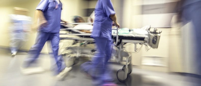 hospital bed medics running
