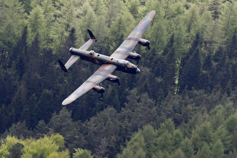 Lancaster bomber swoops over Derwent dam 