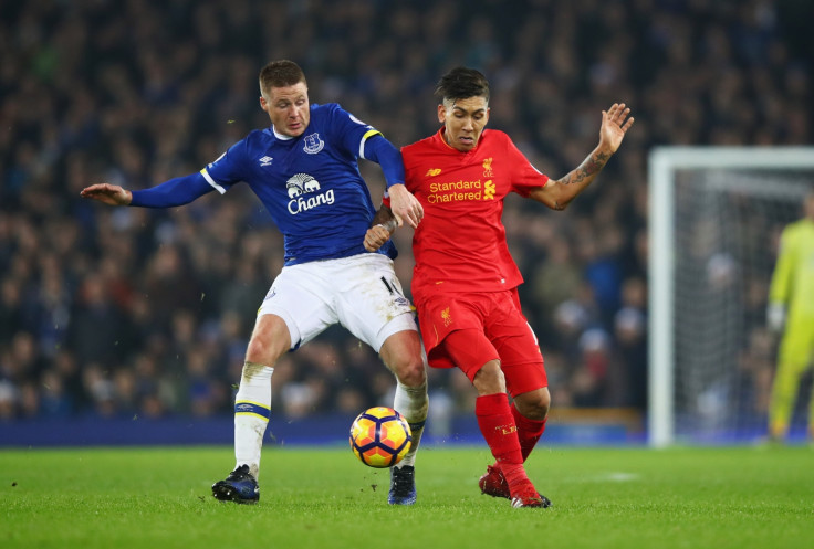 James McCarthy and Roberto Firmino