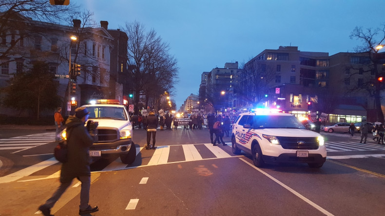 Police cars and protesters in DC