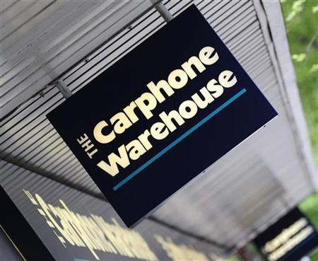 A Carphone Warehouse sign hangs outside a branch in west London