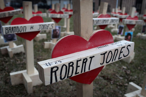 Forty-three crosses sit in a vacant lot in the Englewood neighborhood on January 23, 2017 in Chicago, Illinois. Each cross, created by Greg Zanis, represents a victim of murder in Chicago in 2017. 