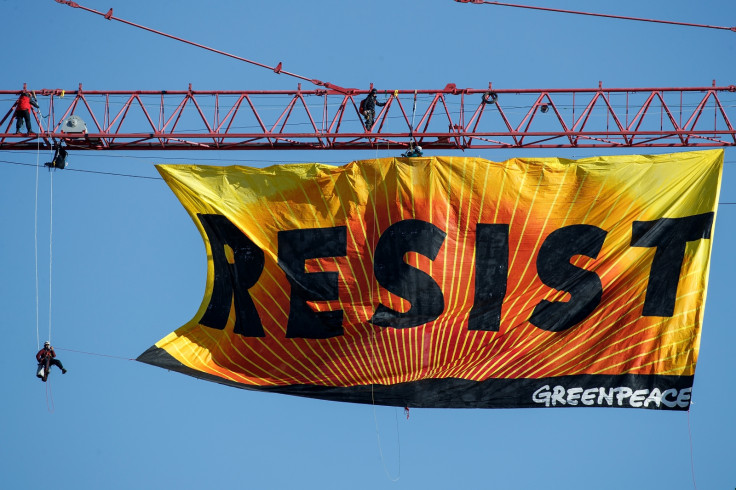 Greenpeace banner resist White House