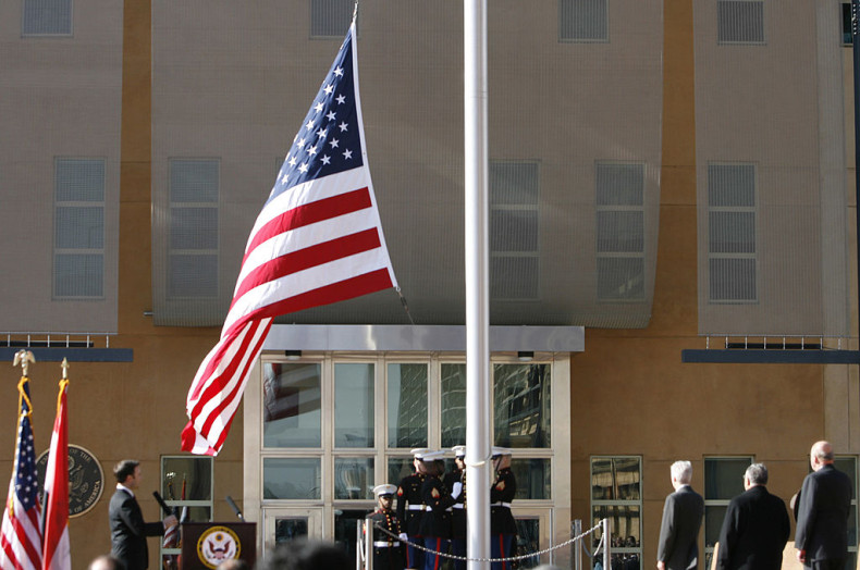 The US flag is raised during a formal dedication ceremony