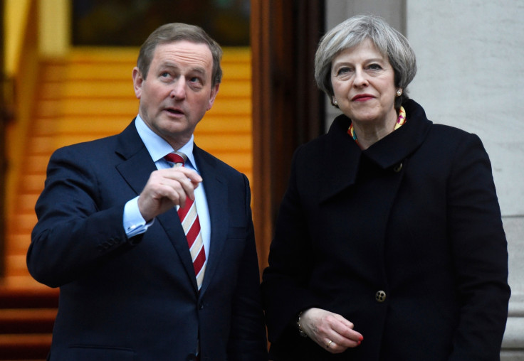 Ireland's Taoiseach Enda Kenny greets Britain's Prime Minister Theresa May to Government Buildings in Dublin