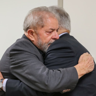 Former Brazilian Presidents Fernando Henrique Cardoso (R) and Luiz Inacio Lula da Silva 