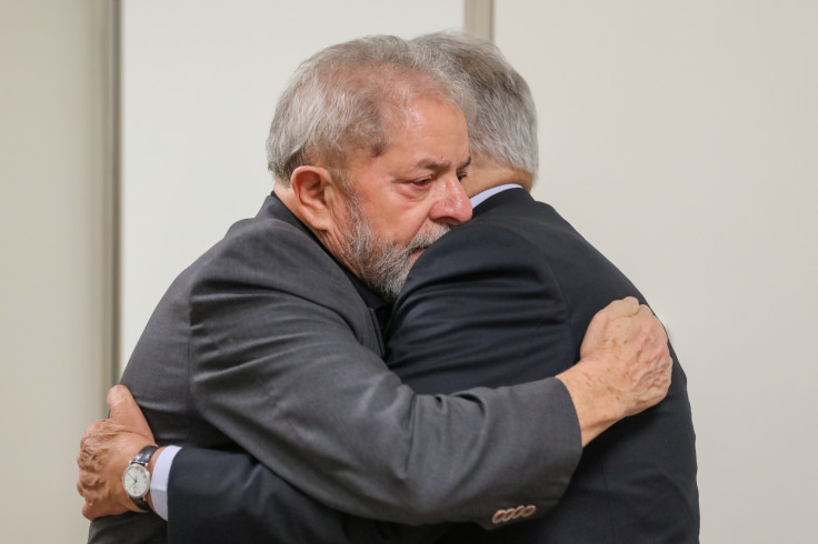 Former Brazilian Presidents Fernando Henrique Cardoso (R) and Luiz Inacio Lula da Silva 