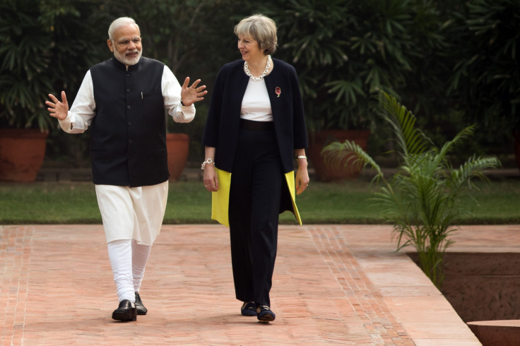 Theresa May and Narendra Modi