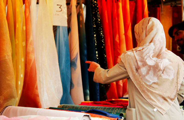 woman in german market wearing headscarf