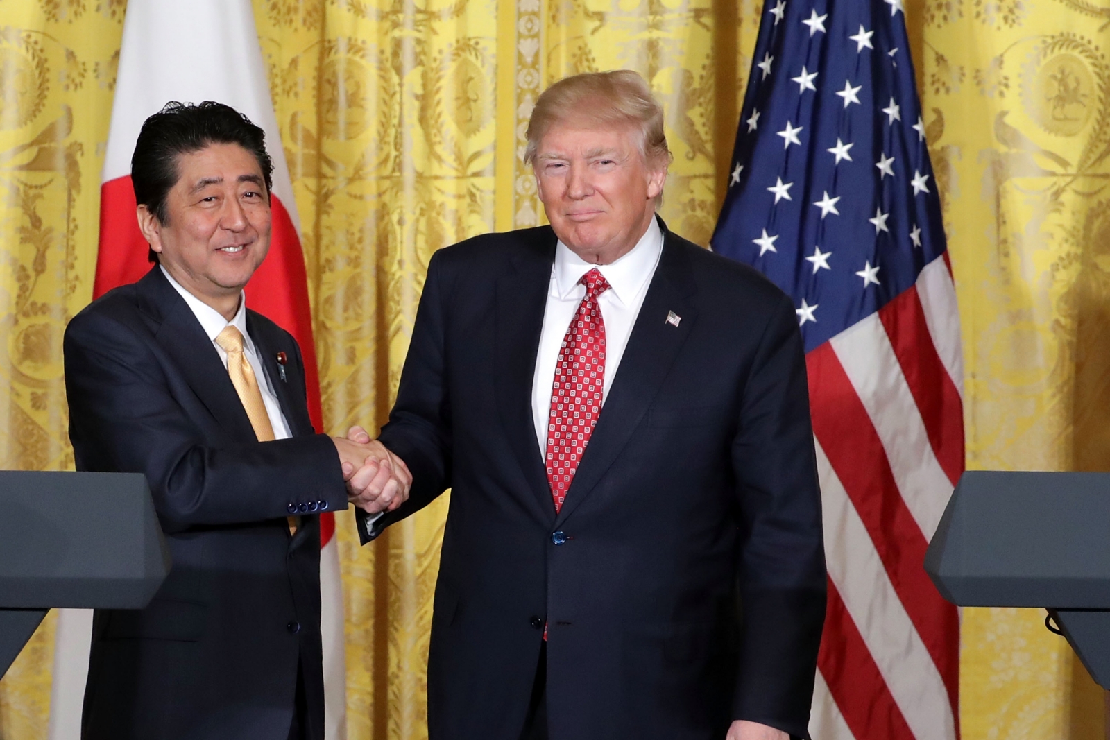 Donald Trump Squeezing Japanese PM Shinzo Abe's Hand In Hilarious Video ...