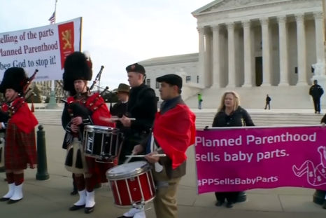 Planned Parenthood supporters and opponents march across US