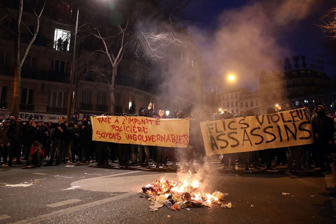 Violence in Paris as police 'baton rape' protests reach the French capital