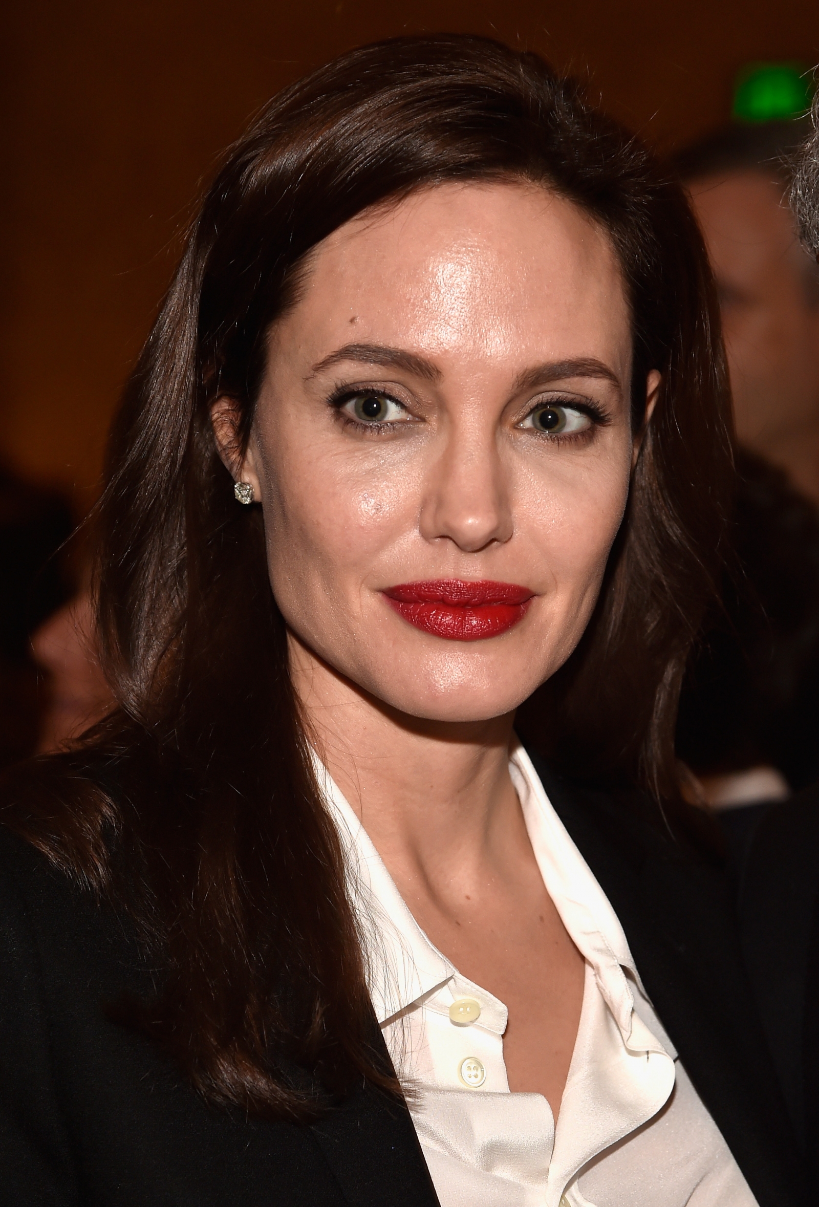 Facial Porn Angelina Jolie - Emotional Angelina Jolie fights back tears speaking about 'difficult time'  after split from Brad Pitt