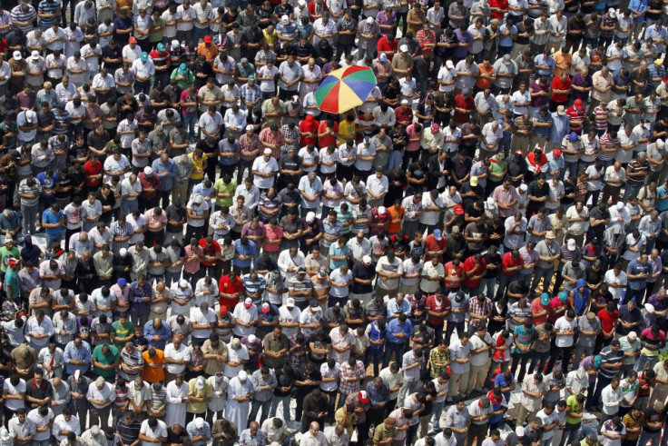 Protesters gather for Friday prayers in Tahrir square in Cairo