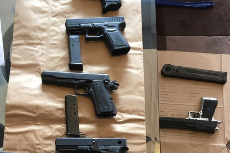 A cache of 3D printed pistols