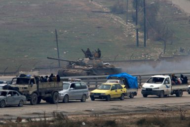 Vehicles bringing people out of eastern Aleppo 