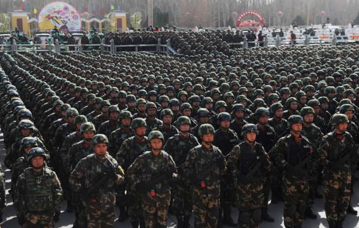 Paramilitary policemen stand in formation