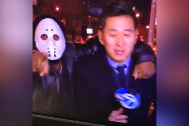 Reporter attacked by man in hockey mask 