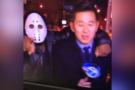 Reporter attacked by man in hockey mask 
