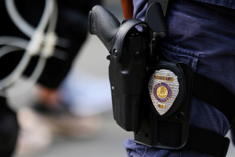 Badge and gun of North Carolina police