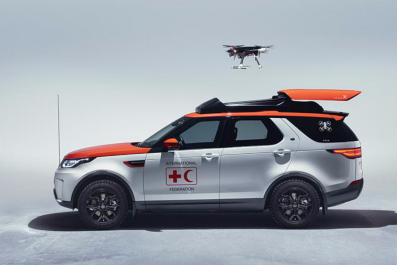 Land Rover Discovery with Red Cross drone