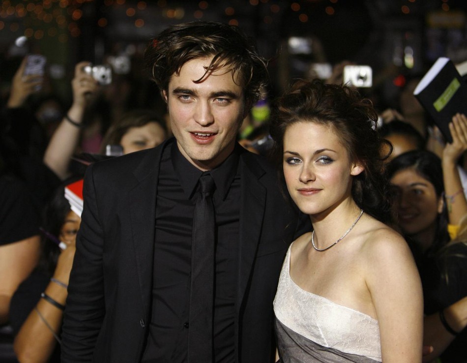 Robert Pattinson and Kristen Stewart pose at the premiere of the movie Twilight in Westwood.