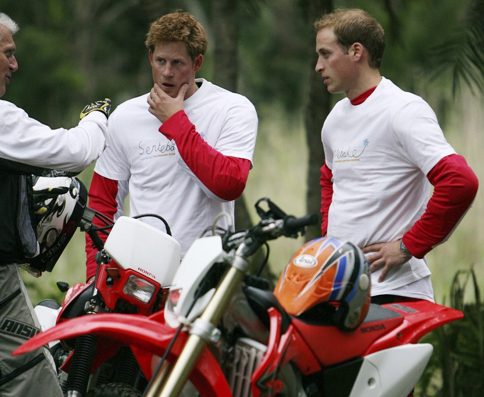 Britain039s Prince William and Prince Harry talk to co-organiser Mike Glover as they stand with their motorcycles before the start of the the Enduro Africa 08 charity motorcycle ride in Port Edward