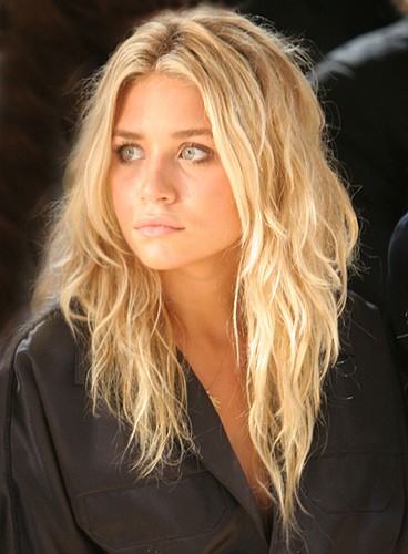 Mary Kate Olsen having fashion advices from twin Spotted clean-cut and classic at New York Fashion Week