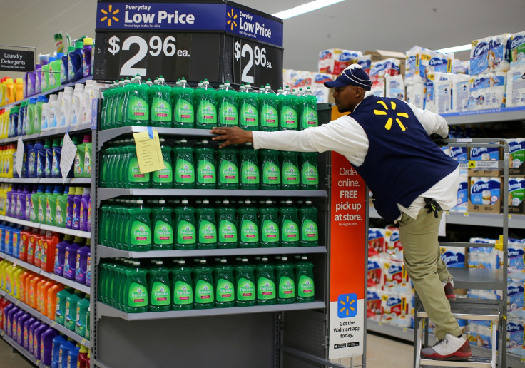 Shop assistant restocking shelves at Walmart