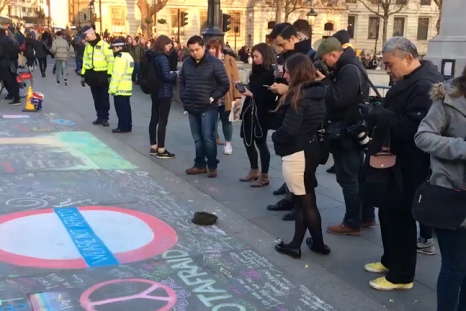 Londoners leave chalk messages of hope and peace in Trafalgar Square after Westminster Attack