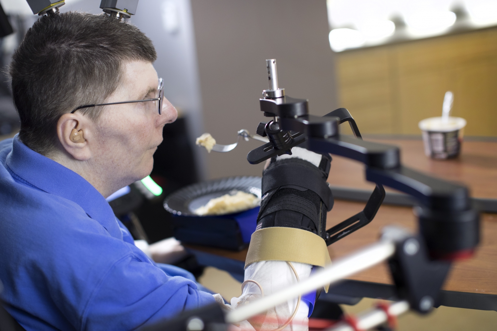 Man paralysed from neck down regains arm movement with innovative brain