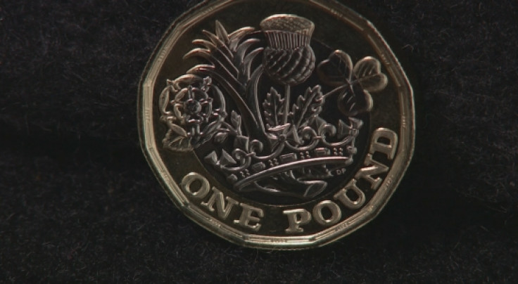 New one pound coin goes into circulation