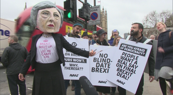 Theresa May effigy gags British citizens on Brexit