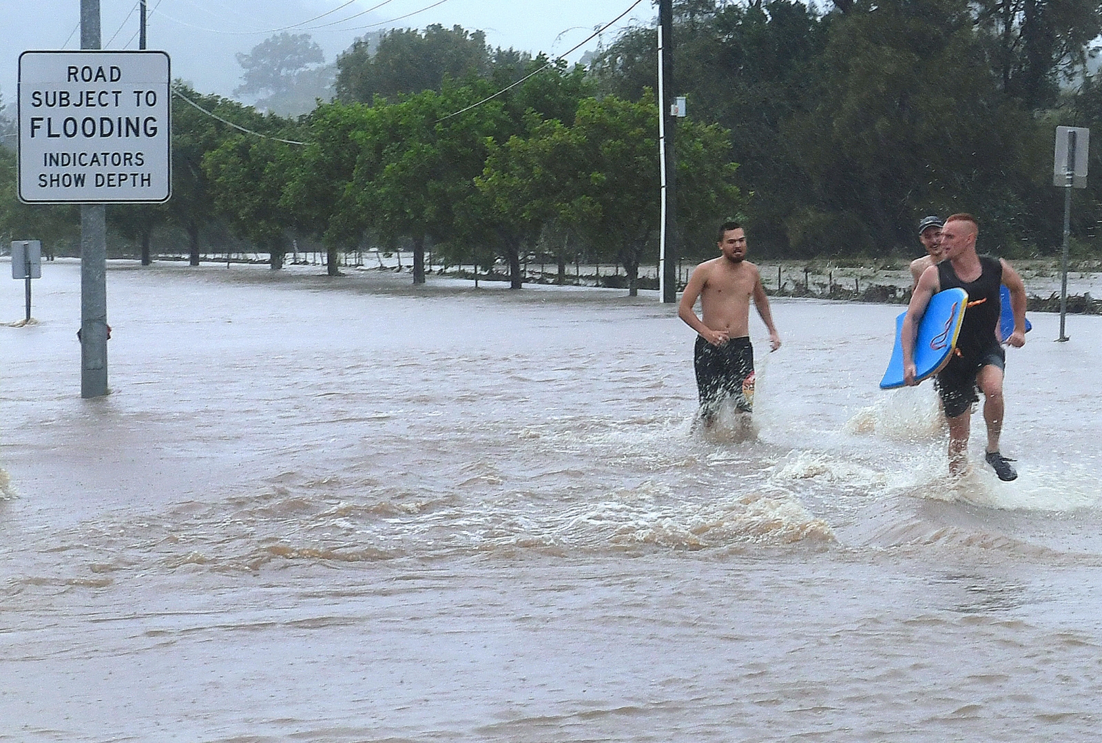 Heavy Rains Wreak Havoc In Australias Queensland As Thousands Ordered