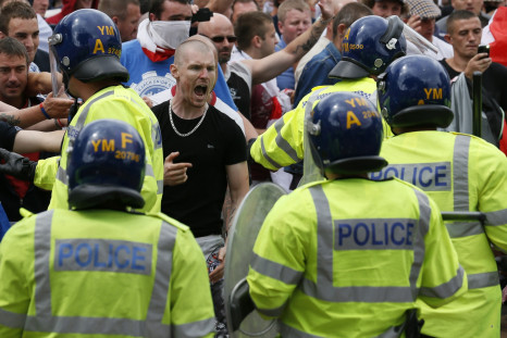 Members of the far-right EDL clash withpolice