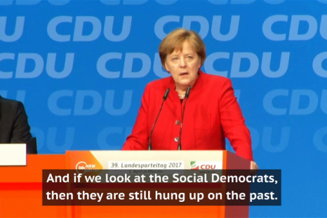 Merkel attacks chancellorship challenger Martin Schulz in first campaign speech