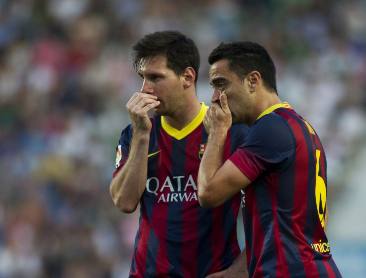 Xavi and Lionel Messi.