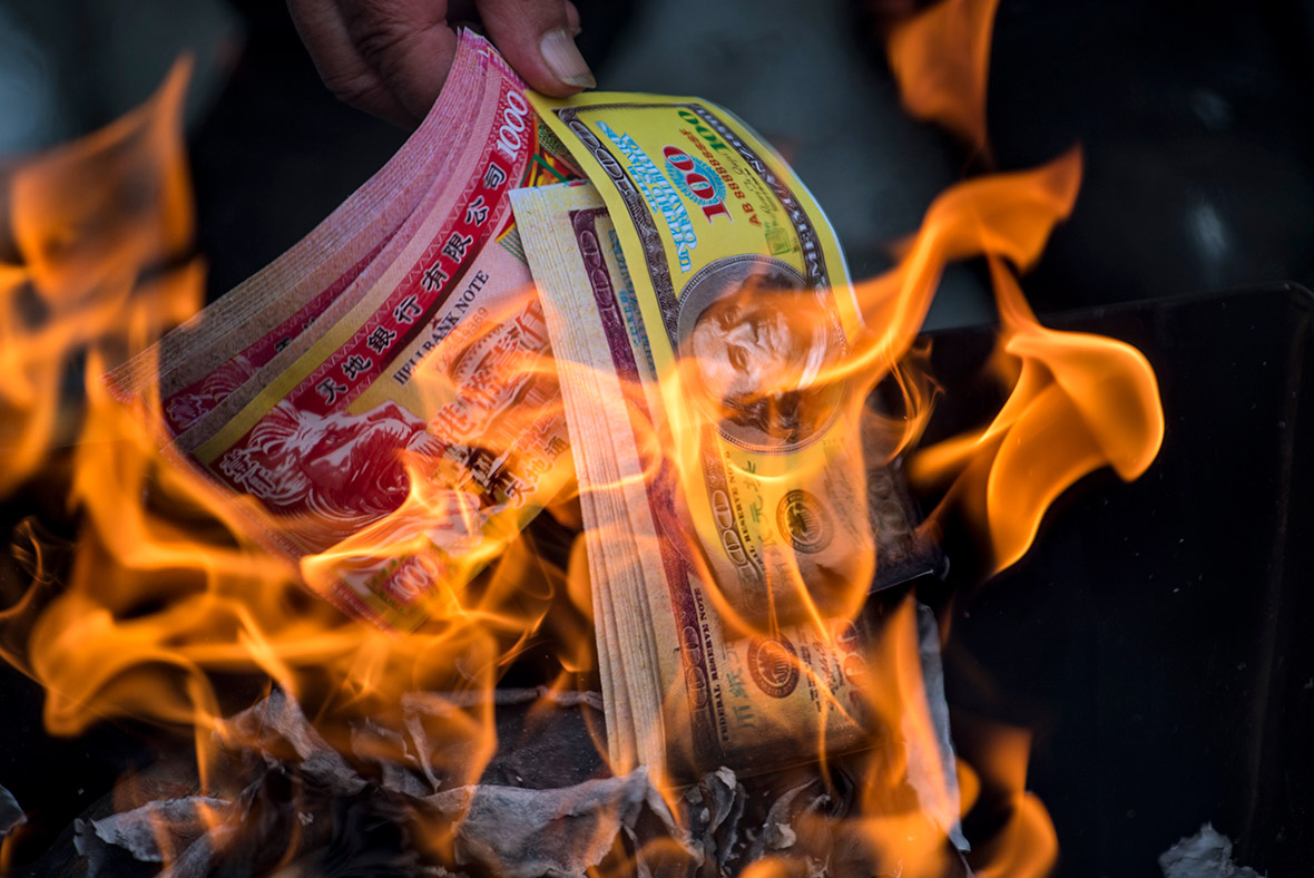 chinese new year traditions burning money