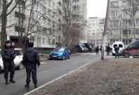 Russian police officers secure a residential area in St. Petersburg, Russia