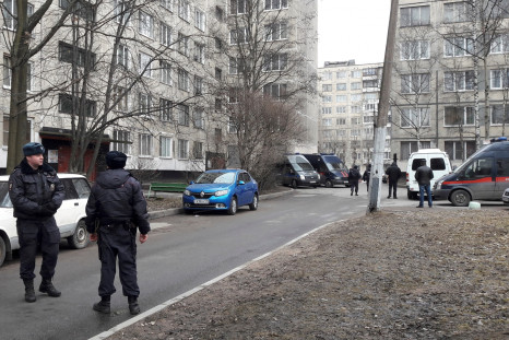 Russian police officers secure a residential area in St. Petersburg, Russia