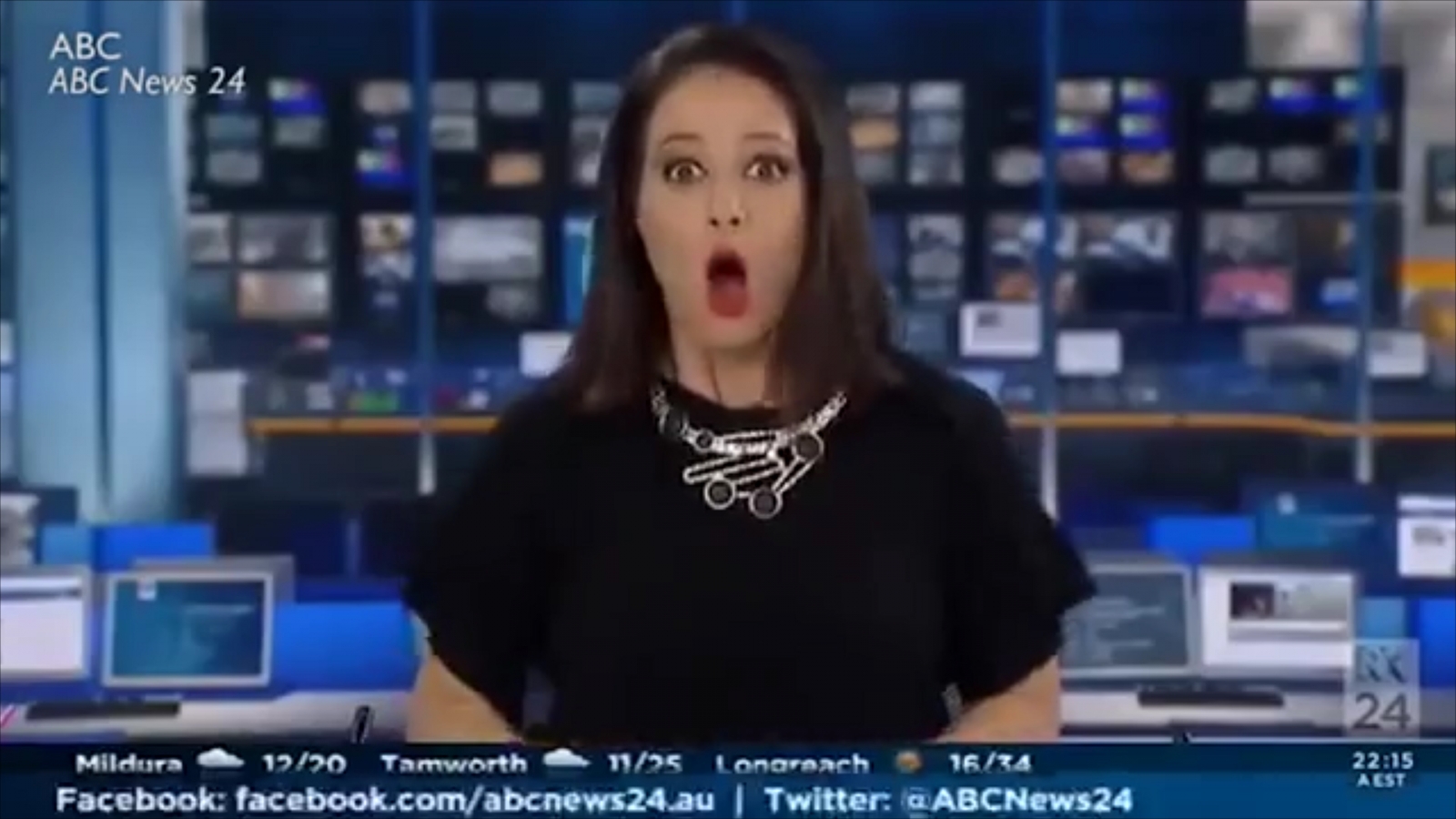 A daydreaming newsreader gasps in shock as she realises she's live on air
